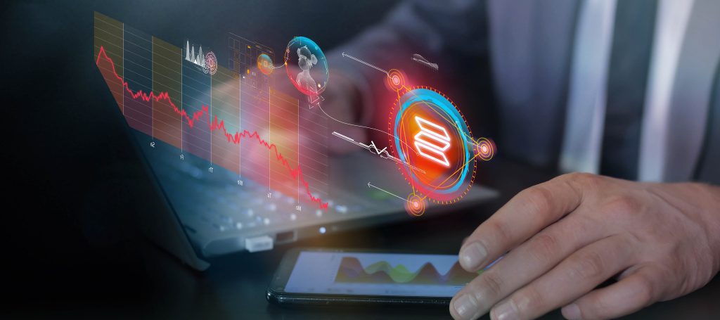 Businessman analyzes crypto market and Solana fall infographic data using laptop and smartphone. Decentralized Applications (dApps)